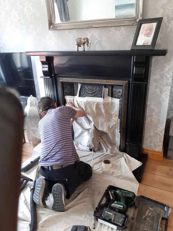 CSIA certified chimney sweep cleaning fireplace in Greenville SC home